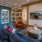 furnished common area with shelves of books
