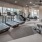 cardio machines with recessed lighting throughout fitness center