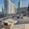 Upper deck, outdoor lounge with seating areas and city views