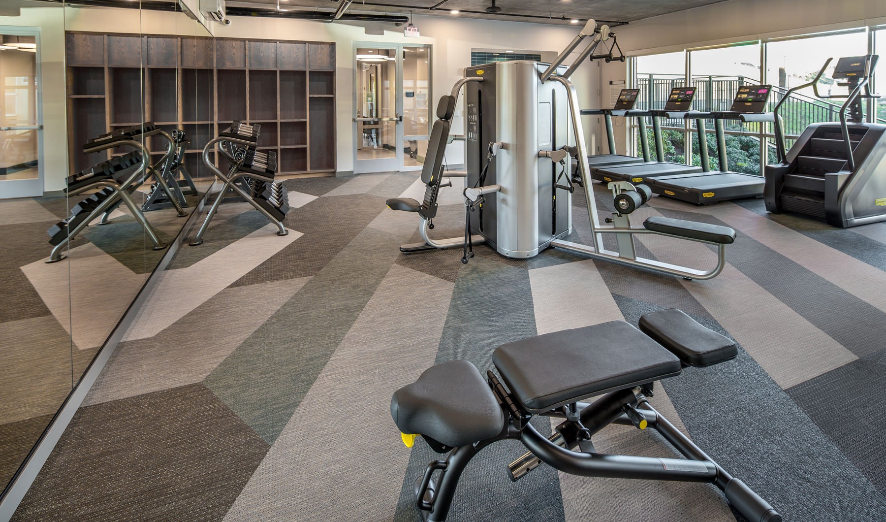 Urban Artistry large, open fitness center with large, bright windows